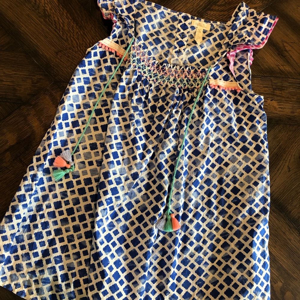 Women’s blue flutter top